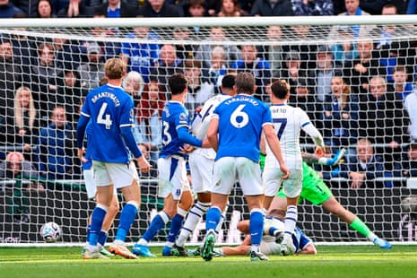 Chelsea's Pedro Neto and teammates celebrate near the goal after scoring against Everton