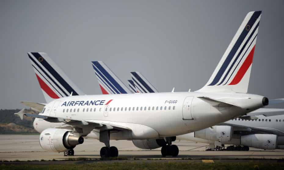 Air France planes are parked on the tarmac of Charles de Gaulle airport