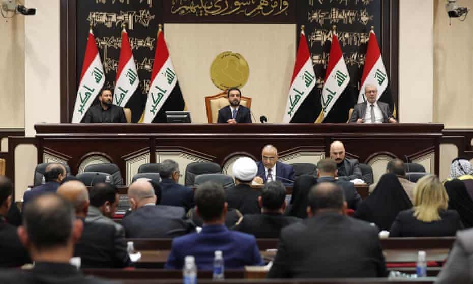 People sitting in the Iraqi parliament