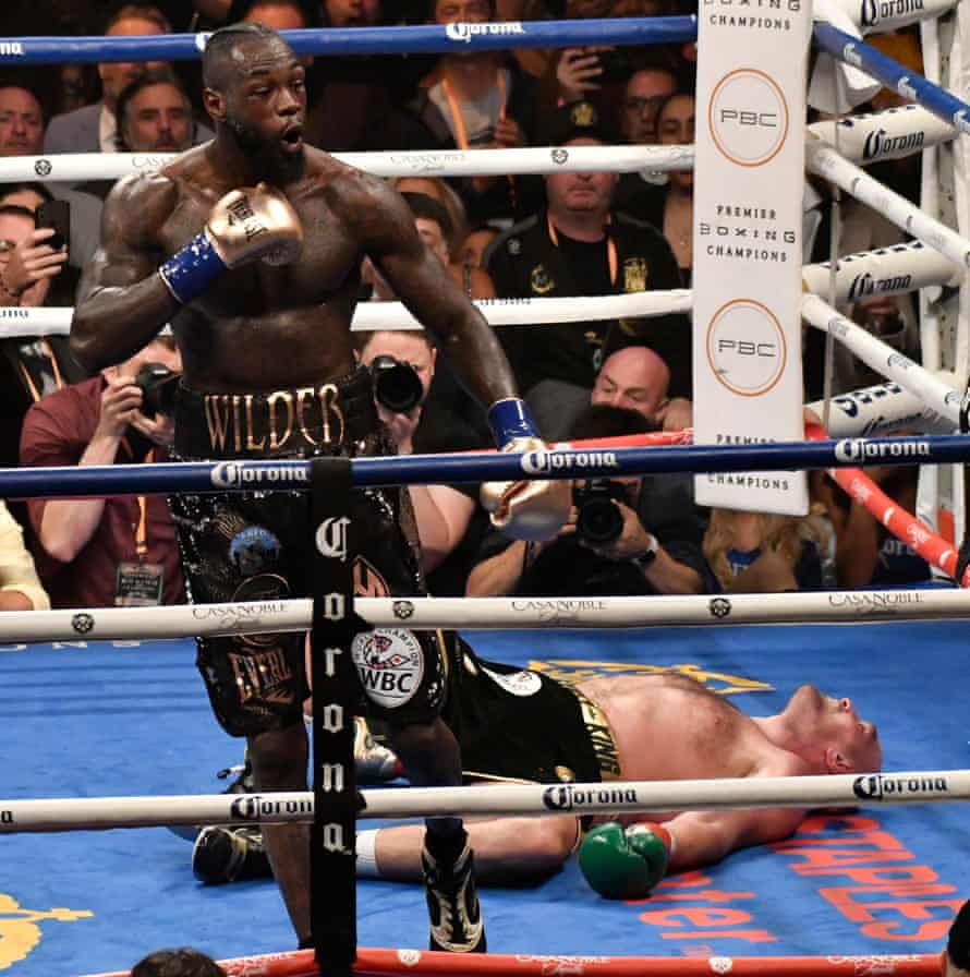 Deontay Wilder knocks down Tyson Fury a second time in the 12th round of their 2018 fight in at the Staple Center Los Angeles, which ended in a draw.