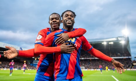 Crystal Palace’s Jeffrey Schlupp (right) celebrates with Tyrick Mitchell after scoring his side’s third goal against Norwich at Selhurst Park.