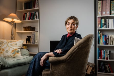Fiona Collier, who lost her parents and sister in a helicopter crash, sitting in an armchair in a living room