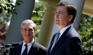 James Comey speaks alongside Robert Mueller at the White House in 2013.