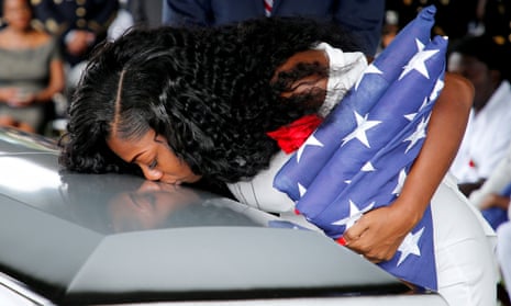 Myeshia Johnson weeps at the funeral in Florida on Saturday of her husband, Sgt La David Johnson, who was among four special forces soldiers killed in Niger.