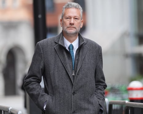 Nathan Gill wearing a grey coat