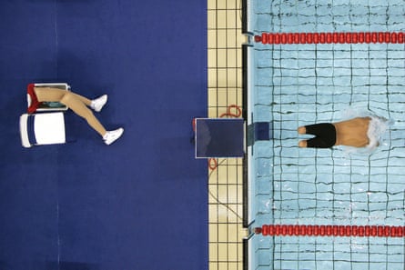 20/9/2004, Summer Paralympics. Aerial view of Javier Torres’s prosthetic legs by the side of the pool as he dives in for the 200M freestyle event in Athens