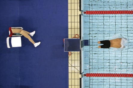 20/9/2004, Summer Paralympics. Aerial view of Javier Torres’s prosthetic legs by the side of the pool as he dives in for the 200m freestyle event in Athens
