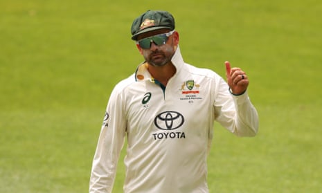 Nathan Lyon gives the thumbs up as the crowd keenly await his 500th Test wicket.