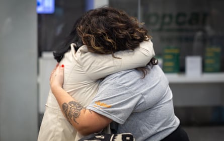 Maria reuniting with her birth mother at Santiago airport