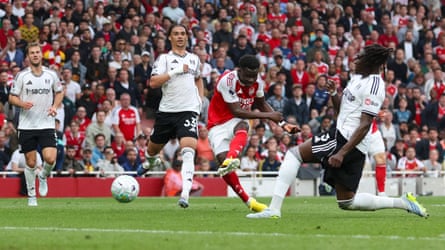 Bukayo Saka scores for Arsenal against Fulham.