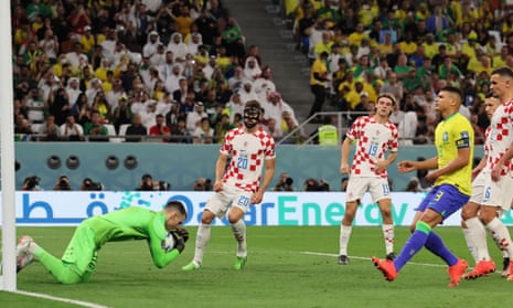 Stalemate: Brazil's Thiago Silva sees his shot saved.