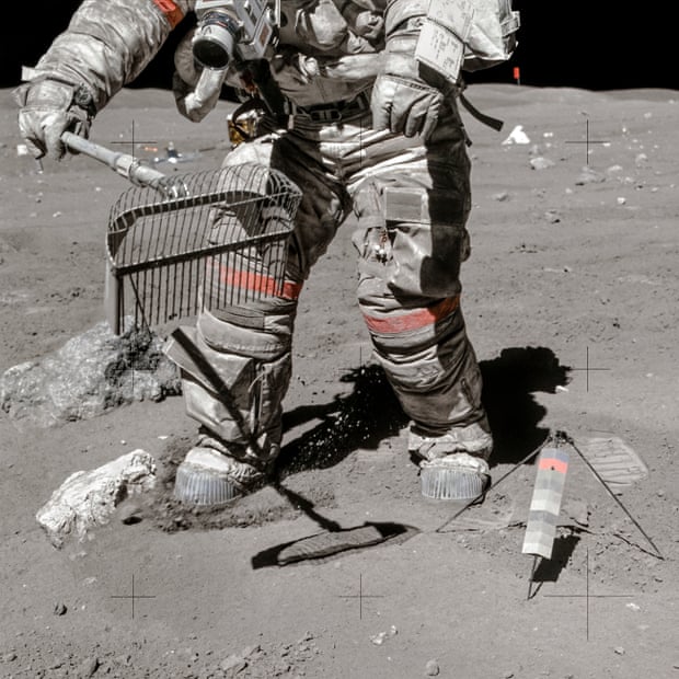 Apollo 16 April 23, 1972 Astronaut Charles Duke films John Young collecting lunar dust