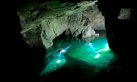 Divers explore the adventure mine.