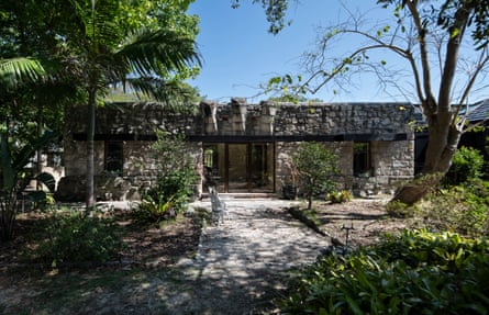 A home built using local stone and knitlock concrete