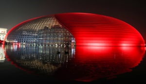 The National Center for the Performing Arts is illuminated in Beijing, China
