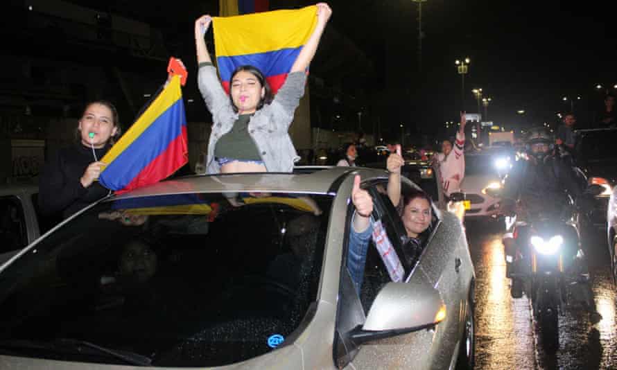 Supporters of Gustavo Petro celebrate his victory in Bogota.