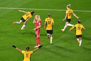 Amalie Vangsgaard of Denmark (centre) reacts as Australia celebrate Hayley Raso’s goal.