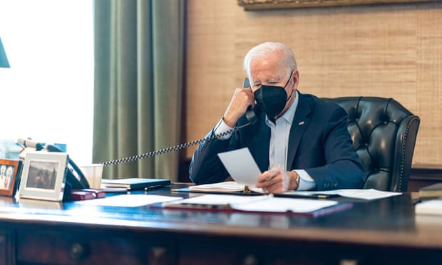 Biden in mask on the phone