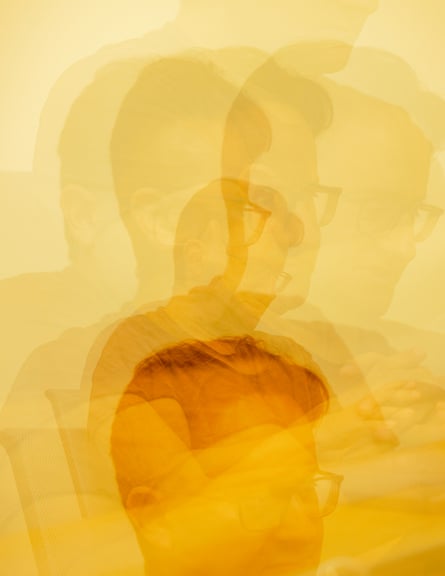 Blurred image of Kaplan on an amber background