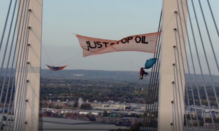 Morgan Trowland and Marcus Decker scaling the bridge on the Dartford Crossing.
