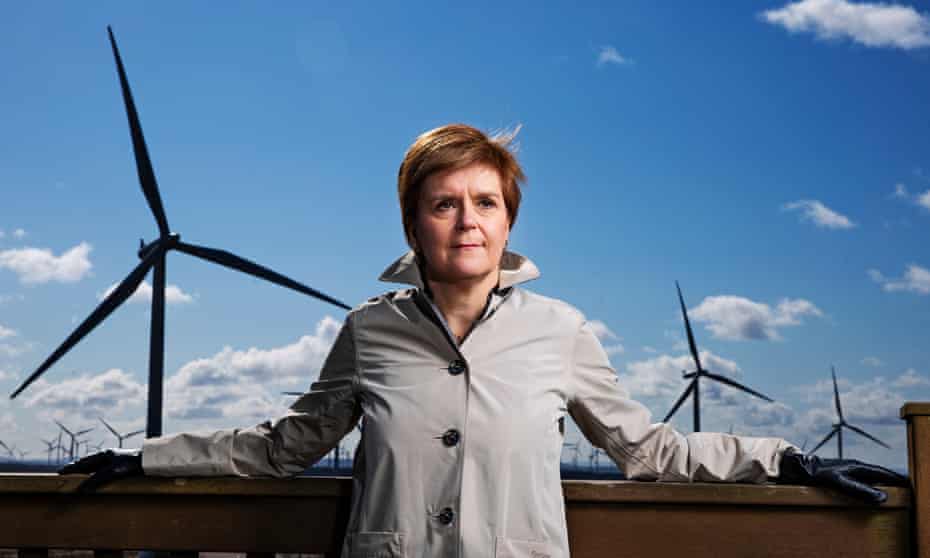 Nicola Sturgeon poses at a windfarm in Scotland