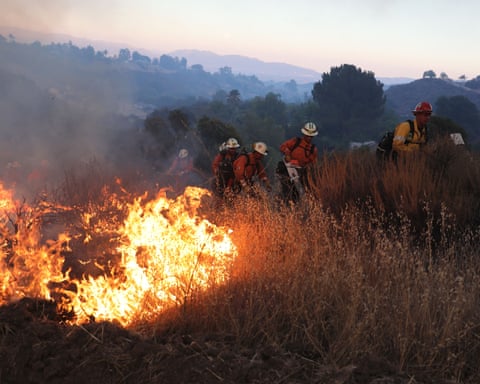 Firefighters battle to contain the Canyon fire in Ventura county, California, on Thursday.