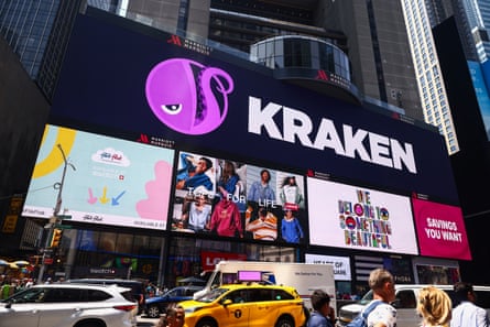 A digital billboard reads ‘Kraken’