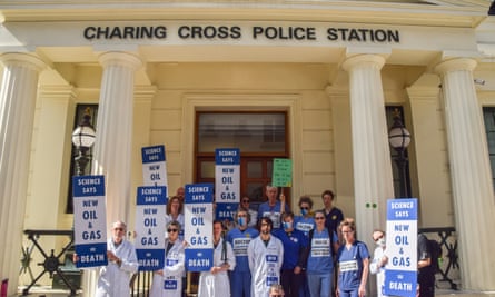 Scientists and doctors staged a protest outside Charing Cross Police Station on Friday in solidarity with activist and scientist Emma Smart, who was arrested for gluing herself to the BEIS government building as part of the Extinction Rebellion climate actions, and is currently on hunger strike in her cell.