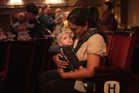 Stage-struck … a parents and babies matinee at the Vaudeville theatre, London.