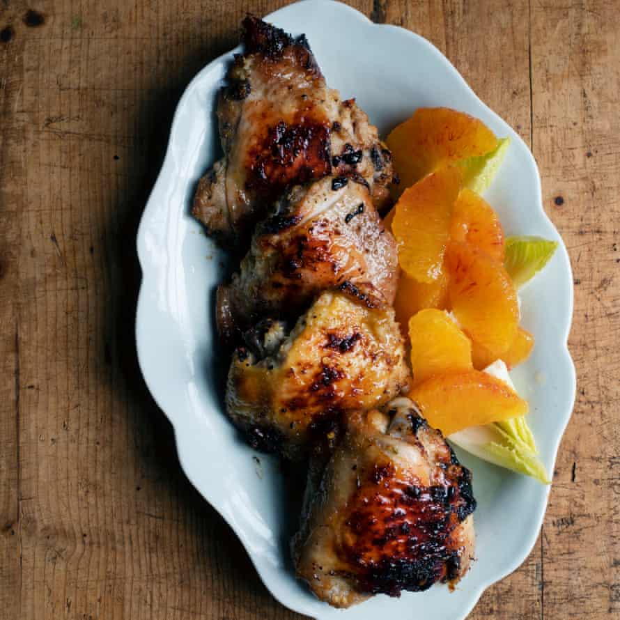 Baked chicken thighs, orange and chicory.