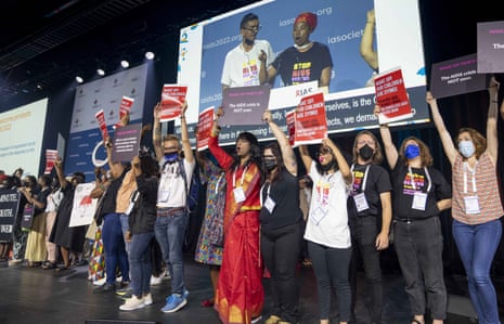 Protesters take the stage during the opening ceremony of the AIDS 2022 conference in Montreal on Friday, 29 July 2022. 
