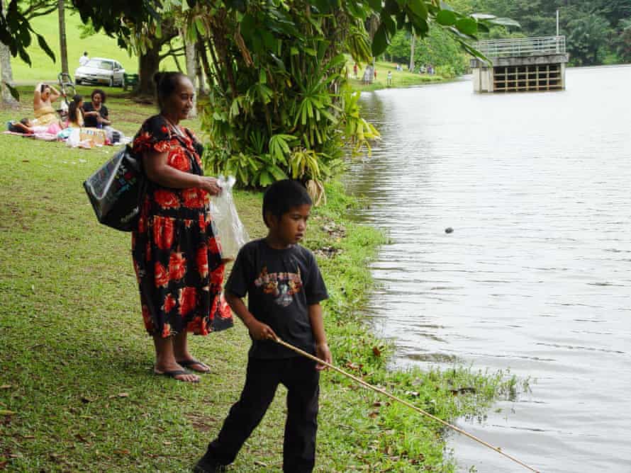 Young Iremamber Sykap fishing in Hawaii with his grandmother in 2012.