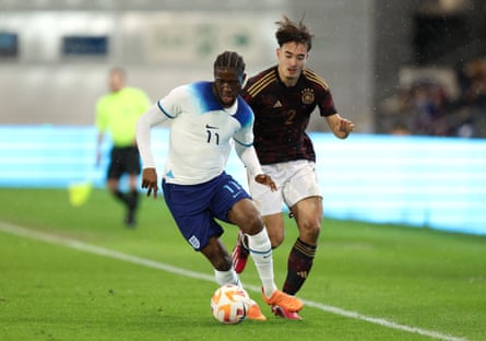 Samuel Iling-Junior battles for possession during a friendly between England U20s and Germany U20s in March.