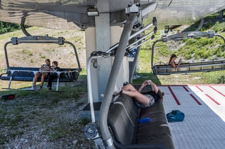 Relaxing on the chair lifts in summer