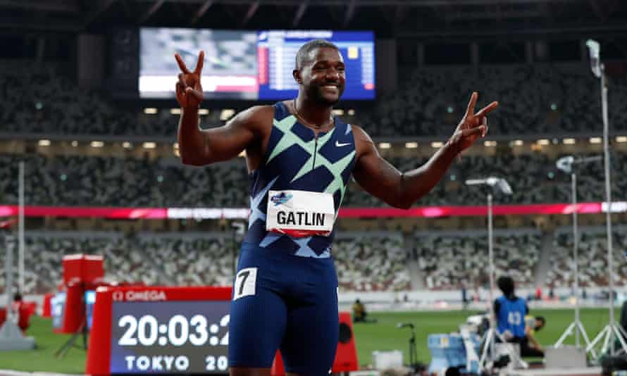 Justin Gatlin celebrates after winning the men’s 100m final.