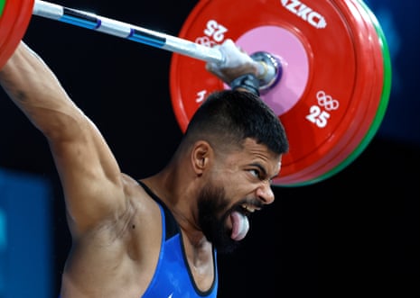Bozhidar Dimitrov Andreev of Bulgaria competes in the men’s 73kg category of the weightlifting competition.