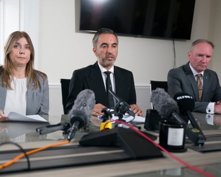 Tracy and Colin Scott (right) with their solicitor, Aamer Anwar