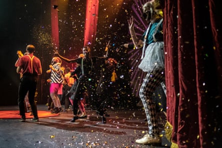 Confetti falls on performers from College of Magic at the end of a show at the Artscape theatre centre, Cape Town.
