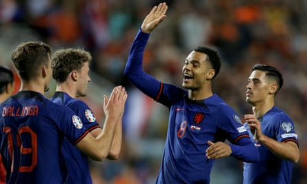 Cody Gakpo (centre) celebrates after scoring his side’s sixth goal during the Euro 2024 qualifying match between Gibraltar and the Netherlands, at the Argarve Stadium