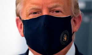 Donald Trump wears a face mask to help limit the risks of spreading Covid-19.