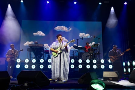 A wide shot of the five-piece Alabama Shakes live band.
