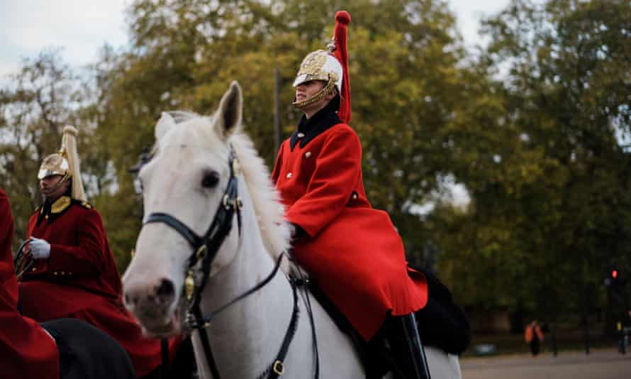 A walk through London for the Travel section. Cavalry officers near Green Park