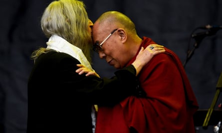with the Dalai Lama at the Glastonbury festival in 2015.