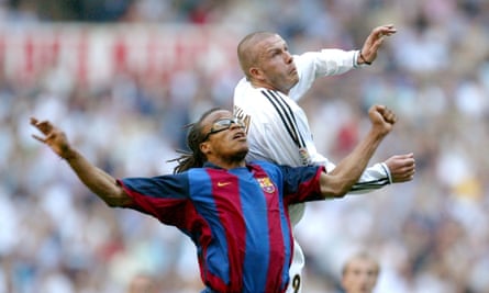 Barcelona’s Edgar Davids tussles with David Beckham of Real Madrid in April 2004