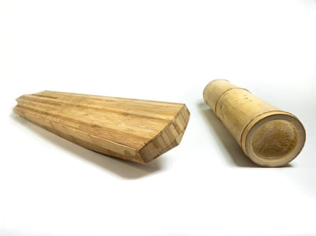 A bamboo cricket bat prototype and a section of bamboo
