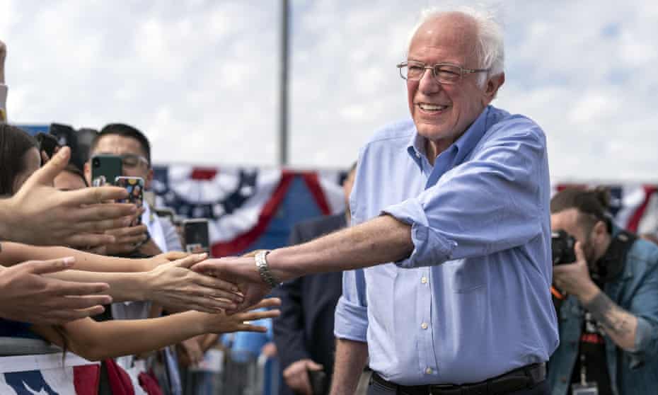 Bernie Sanders greets supporters as he arrives at a campaign rally in Santa Ana, California, on 21 February.