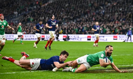 Jamison Gibson-Park of Ireland dives over to score his side’s first try.