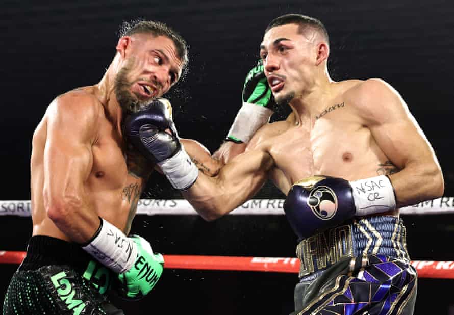 Teofimo Lopez Jr, right, and Vasiliy Lomachenko