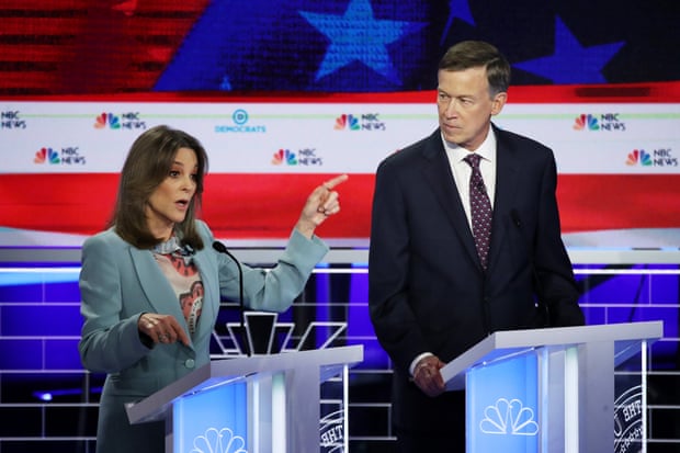 ‘Some might consider a safe choice is the most dangerous choice we can make’: Williamson with John Hickenlooper at the first Democratic presidential debate, 27 June, Miami, Florida.