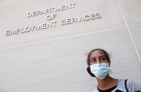 Diana Yitbarek, 44, of Washington DC, stands outside the Department of Employment Services, after trying to find out about her unemployment benefits on 16 July.